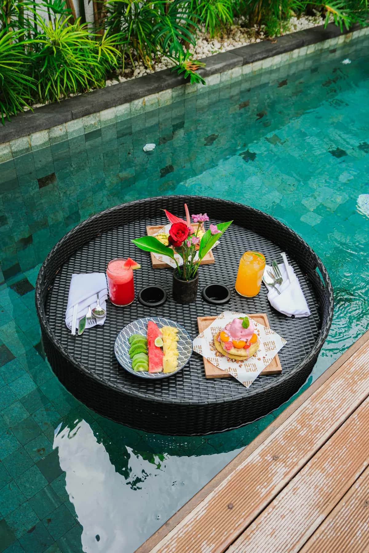 Floating breakfast tray in a private pool at Tannari Villas