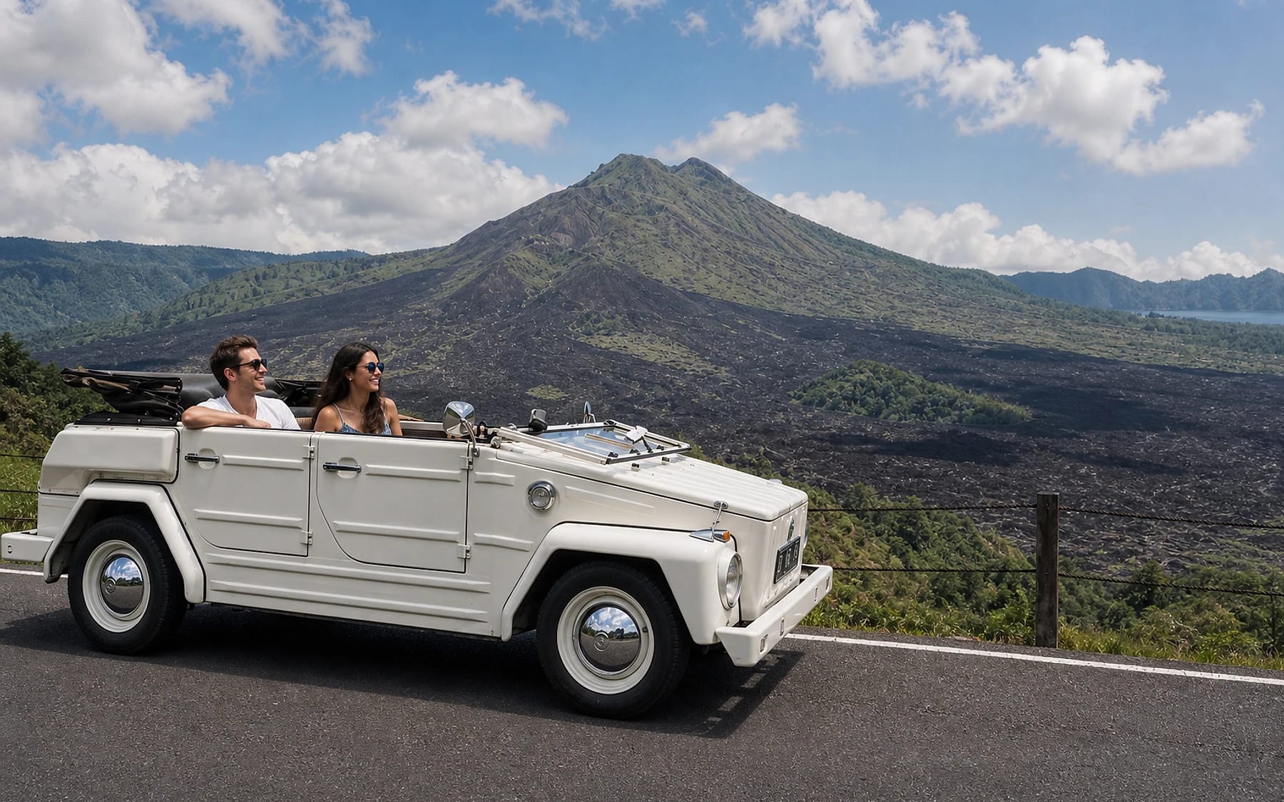 Vintage open-top tour car parked on a quiet Ubud village road